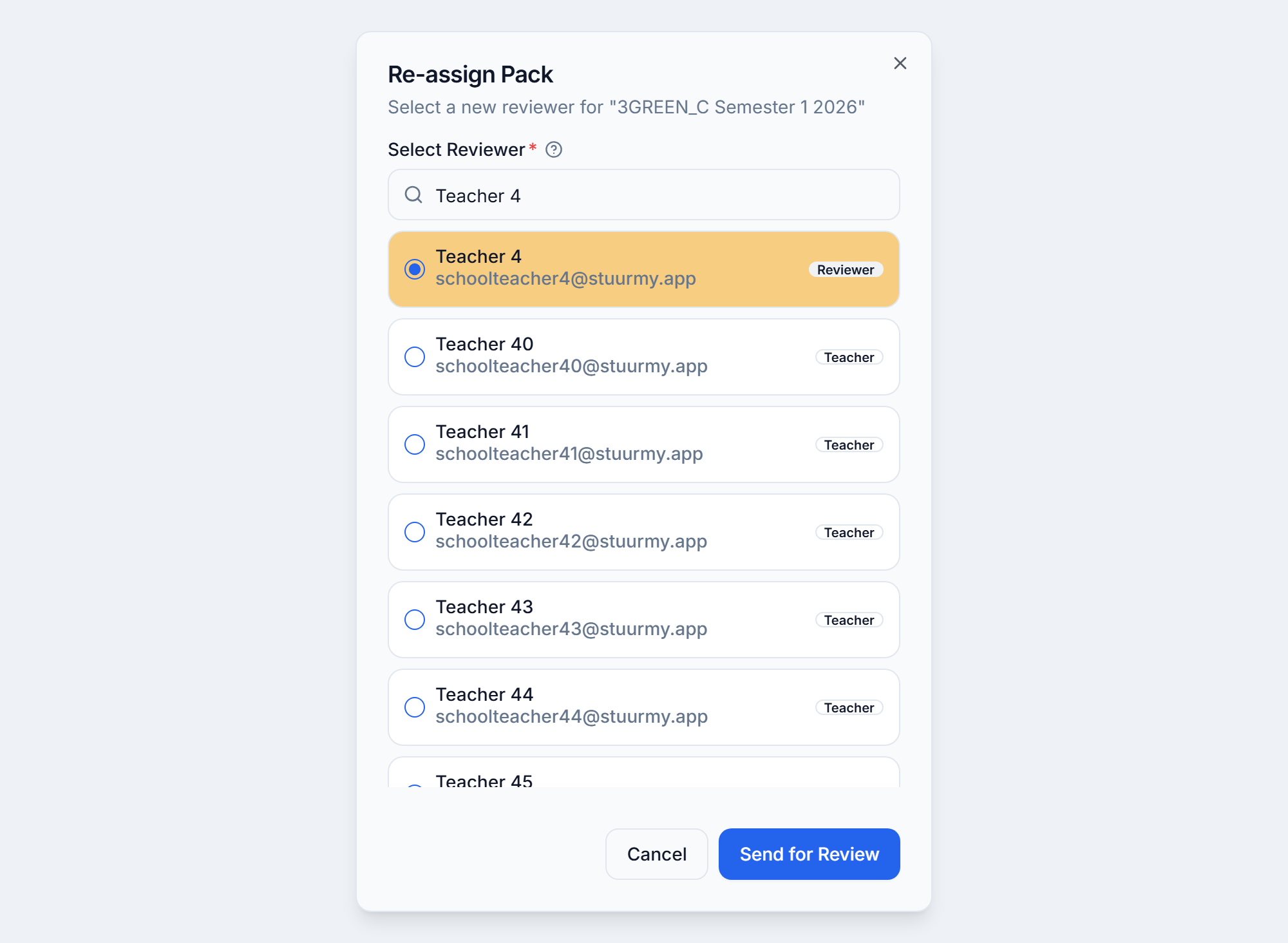 The Re-assign Pack dialog, with a new reviewer chosen from the list of school members
